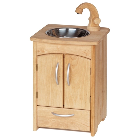 Children's sink in solid alder wood. In the front two doors open on a blue lacquered bucket. Underneath is a drawer. On the top is a round bassin in stainless steal with a wooden crane.
