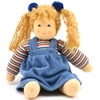 Play doll in organic cotton and wool with blond hair and blue eyes. She sits with her arms displayed on each side and wears a blue white red green striped sweatshirt and a blue gown.