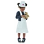 Een meisje staat gekleed in een wit verpleegsterschort en -muts met een rood kruisje erop. Ze draagt een zwarte bloes met witte stippen en dezelfde snikkers. Ze draagt een beertje in haar handen.