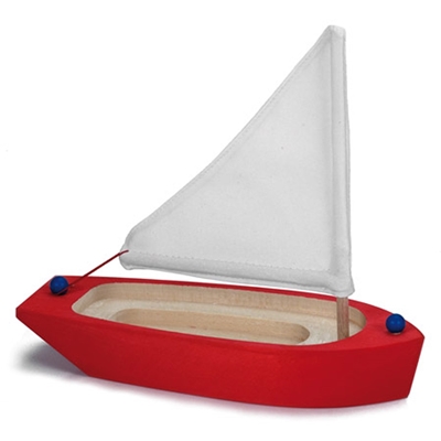 Rode speelgoed zeilboot in massief hout met wit zeil van zuiver katoen