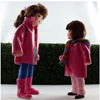 Erna Meyer dollhouse little girl doll: big sister Louisa is talking to her little sister Nele, both in dark pink coat.