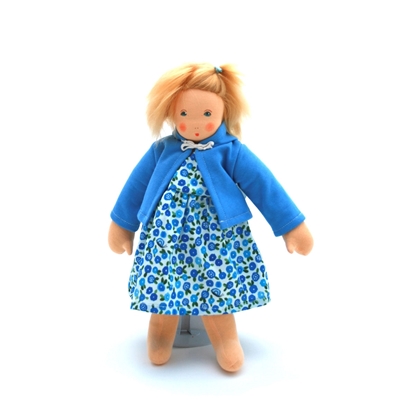 Nanchen doll with blue eyes, blond mohair hair, white dress full of little blue flowers and light blue hooded jacket. 