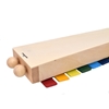 Back side of wooden Voggenreiter xylophone with soundboard and two mallets stored inside it.