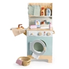 Light blue toy washing machine, ironing board and iron, drying rack, laundry basket, and laundry supplies.